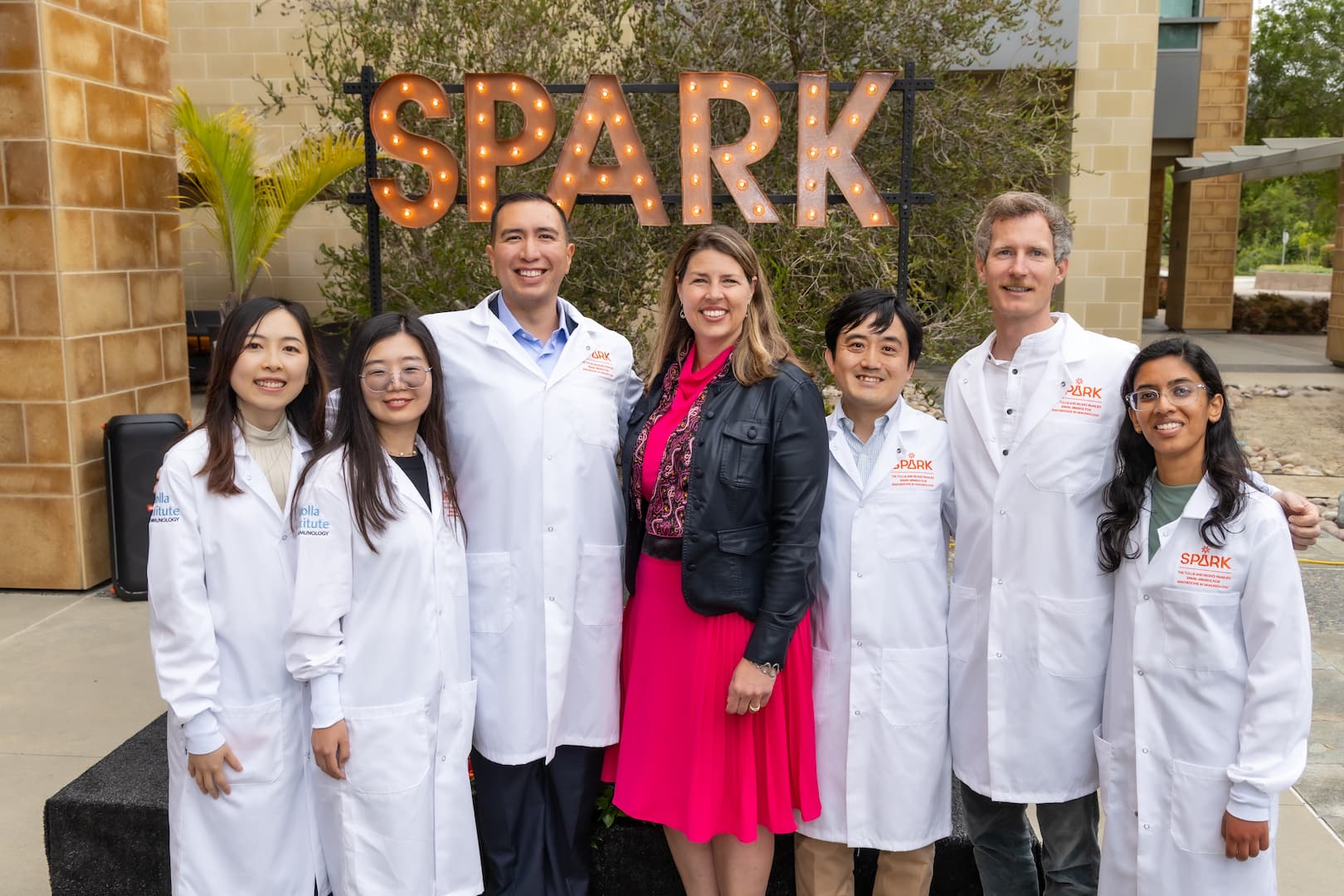 Left to right: 2024 SPARK winners Jingru Fang, Ph.D., Chen Sun, Ph.D., and Isaac López-Moyado, Ph.D., with LJI Professor, President & CEO Erica Ollmann Saphire, Ph.D, MBA, as well as SPARK winners Kazumasa Suzuki, M.D., Ph.D., Thomas Riffelmacher, Ph.D., and Rimjhim Agarwal