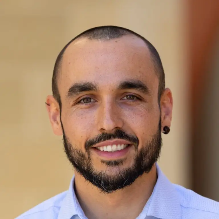 Portrait photo of Miguel Reina-Campos, Ph.D.